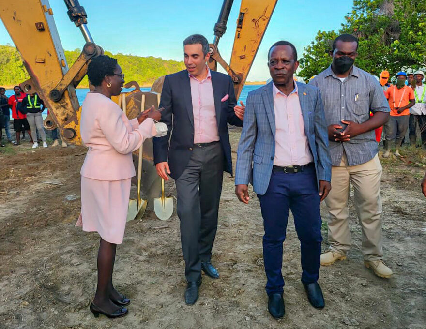 Mohammed Asaria of Range Developments stops to chat with Grenada's Minister for Tourism, Hon. Clarice Modeste-Curwen while escorting Grenada's Prime Minister, Hon. Dr. Keith Mitchell